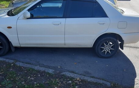 Mazda Familia, 2001 год, 350 000 рублей, 6 фотография