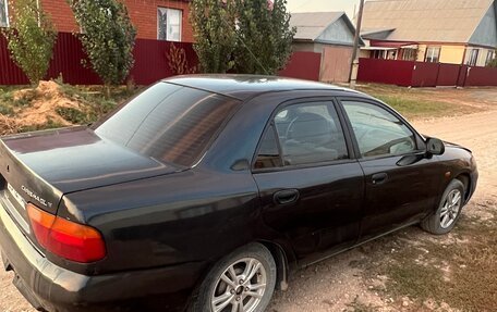 Mitsubishi Carisma I, 1997 год, 125 000 рублей, 4 фотография