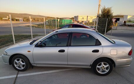 Mazda 323, 1997 год, 240 000 рублей, 3 фотография