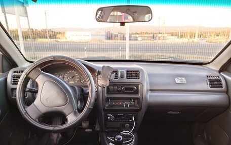 Mazda 323, 1997 год, 240 000 рублей, 5 фотография