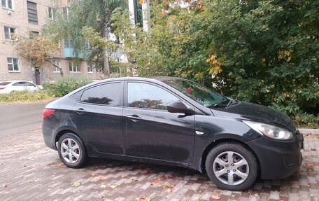 Hyundai Solaris II рестайлинг, 2011 год, 850 000 рублей, 3 фотография