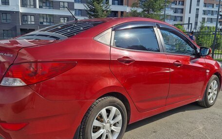 Hyundai Solaris II рестайлинг, 2011 год, 890 000 рублей, 13 фотография