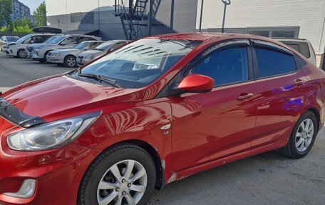 Hyundai Solaris II рестайлинг, 2011 год, 890 000 рублей, 20 фотография