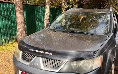 Mitsubishi Outlander III рестайлинг 3, 2009 год, 920 000 рублей, 1 фотография