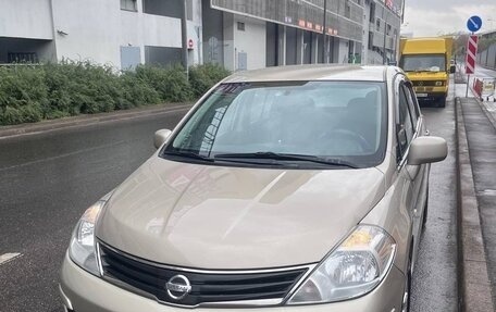Nissan Tiida, 2013 год, 890 000 рублей, 1 фотография
