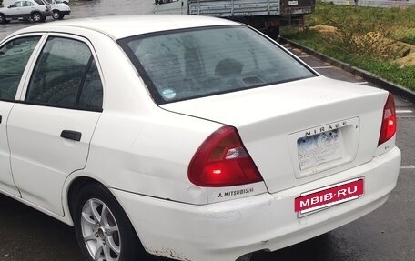 Mitsubishi Mirage VI рестайлинг, 1999 год, 135 000 рублей, 5 фотография