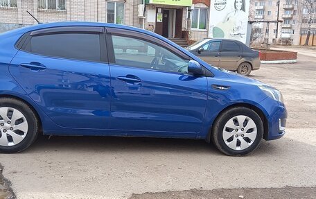 KIA Rio III рестайлинг, 2012 год, 695 000 рублей, 6 фотография