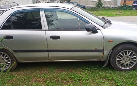Mitsubishi Carisma I, 2003 год, 250 000 рублей, 3 фотография