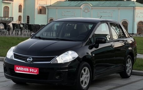 Nissan Tiida, 2010 год, 670 000 рублей, 3 фотография