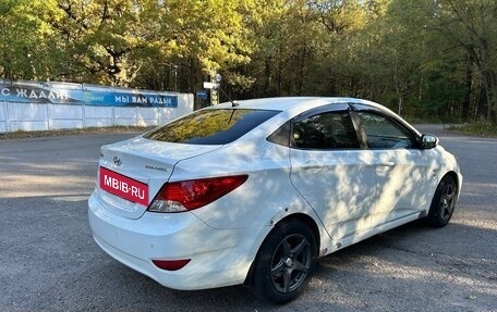 Hyundai Solaris II рестайлинг, 2011 год, 650 000 рублей, 2 фотография