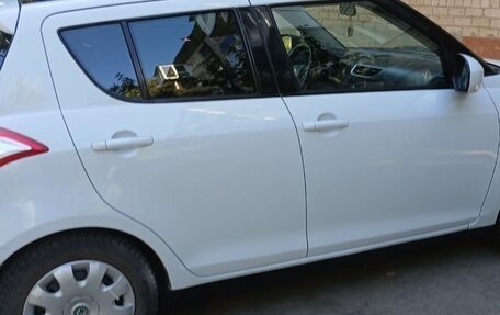 Suzuki Swift IV, 2011 год, 630 000 рублей, 2 фотография