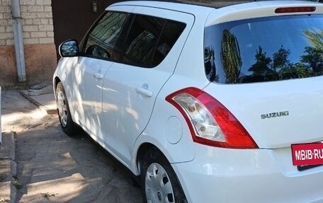 Suzuki Swift IV, 2011 год, 630 000 рублей, 3 фотография