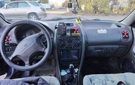 Mitsubishi Carisma I, 1997 год, 170 000 рублей, 10 фотография