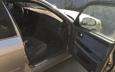 KIA Magentis I, 2004 год, 170 000 рублей, 13 фотография