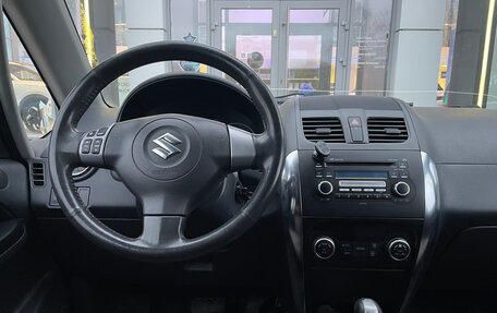 Suzuki SX4 II рестайлинг, 2010 год, 750 000 рублей, 23 фотография