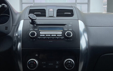 Suzuki SX4 II рестайлинг, 2010 год, 750 000 рублей, 24 фотография