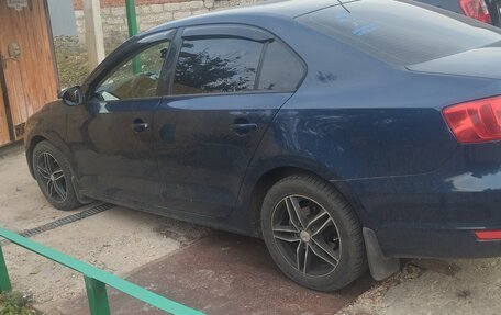 Volkswagen Jetta VI, 2012 год, 1 150 000 рублей, 4 фотография