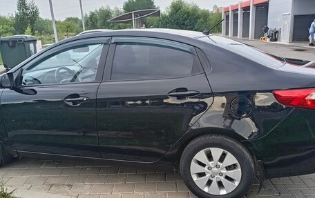 KIA Rio III рестайлинг, 2011 год, 789 000 рублей, 19 фотография
