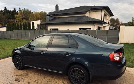 Volkswagen Jetta VI, 2009 год, 590 000 рублей, 3 фотография