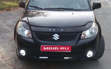 Suzuki SX4 II рестайлинг, 2010 год, 650 000 рублей, 1 фотография