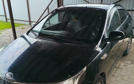 KIA Rio III рестайлинг, 2012 год, 670 000 рублей, 5 фотография