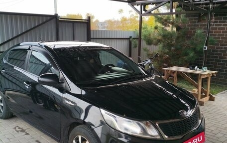 KIA Rio III рестайлинг, 2012 год, 670 000 рублей, 2 фотография