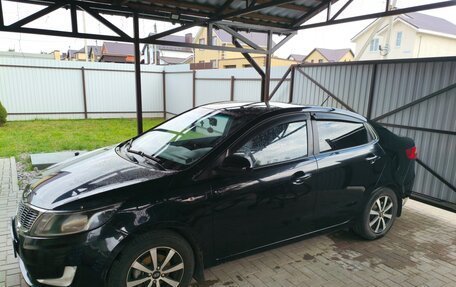 KIA Rio III рестайлинг, 2012 год, 670 000 рублей, 19 фотография