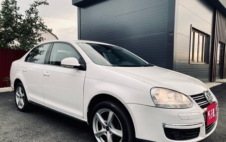 Volkswagen Jetta VI, 2010 год, 750 000 рублей, 2 фотография