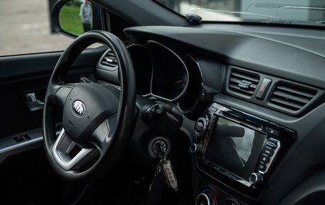 KIA Rio III рестайлинг, 2013 год, 695 000 рублей, 13 фотография