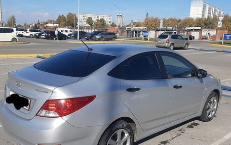 Hyundai Solaris II рестайлинг, 2011 год, 555 555 рублей, 18 фотография