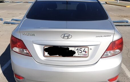 Hyundai Solaris II рестайлинг, 2011 год, 555 555 рублей, 17 фотография