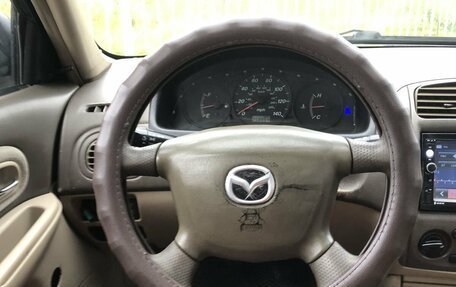 Mazda Protege, 2001 год, 140 000 рублей, 12 фотография