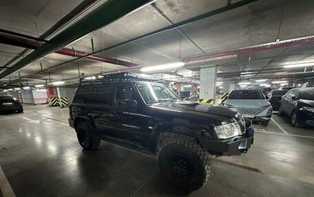 Nissan Patrol, 2009 год, 3 000 000 рублей, 10 фотография