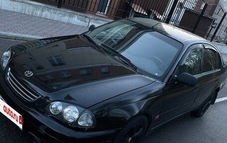 Toyota Avensis III рестайлинг, 1998 год, 199 999 рублей, 21 фотография