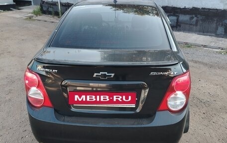 Chevrolet Aveo III, 2013 год, 700 000 рублей, 3 фотография