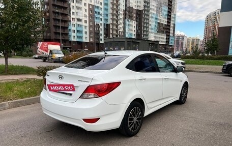 Hyundai Solaris II рестайлинг, 2011 год, 590 000 рублей, 13 фотография