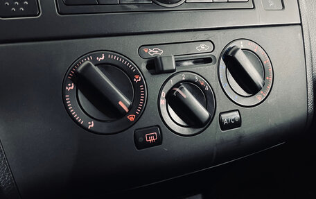 Nissan Tiida, 2011 год, 760 000 рублей, 16 фотография