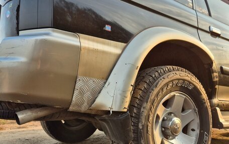 Mitsubishi Pajero Sport II рестайлинг, 2002 год, 395 000 рублей, 32 фотография