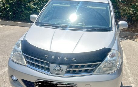 Nissan Tiida, 2009 год, 750 000 рублей, 8 фотография