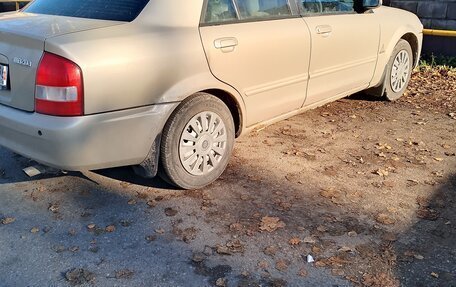 Mazda Familia, 1999 год, 270 000 рублей, 2 фотография