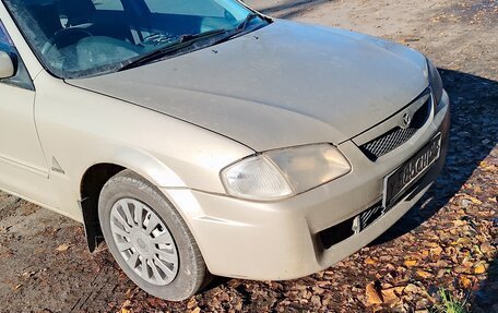 Mazda Familia, 1999 год, 270 000 рублей, 3 фотография