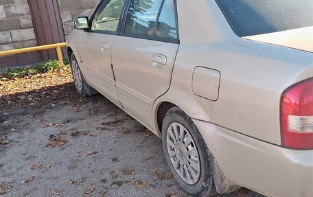 Mazda Familia, 1999 год, 270 000 рублей, 5 фотография