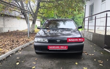 Nissan Primera II рестайлинг, 1991 год, 230 000 рублей, 12 фотография