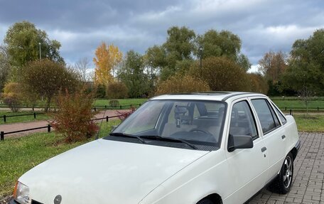 Opel Kadett E рестайлинг, 1987 год, 150 000 рублей, 38 фотография