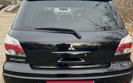 Mitsubishi Outlander III рестайлинг 3, 2006 год, 990 000 рублей, 2 фотография