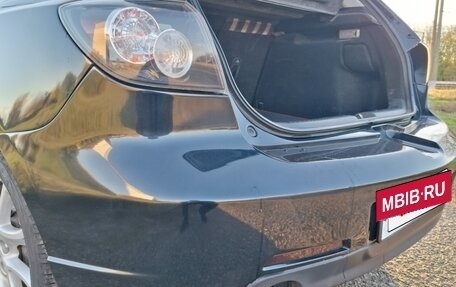 Mazda 3, 2004 год, 16 фотография