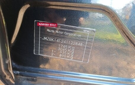 Mazda 3, 2004 год, 14 фотография