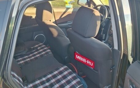 Mazda 3, 2004 год, 13 фотография