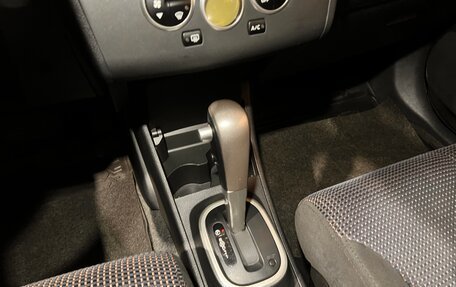 Nissan Tiida, 2010 год, 965 000 рублей, 12 фотография