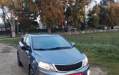 KIA Rio III рестайлинг, 2012 год, 700 000 рублей, 2 фотография